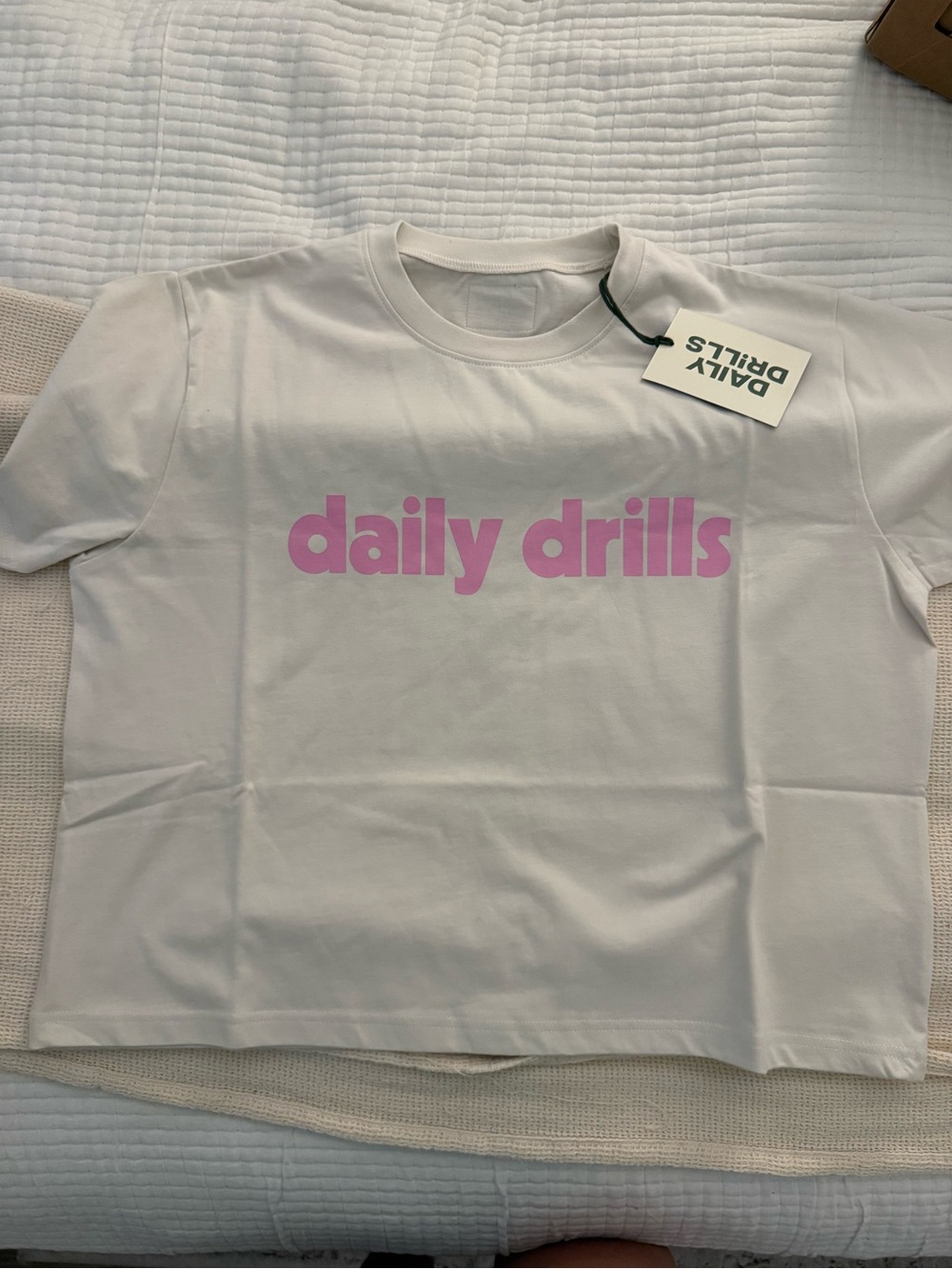 Daily Drills White Tee with Pink Logo - Women's Short Sleeve